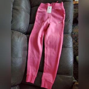 Nike Women's standard fit high rise sweatpants pink